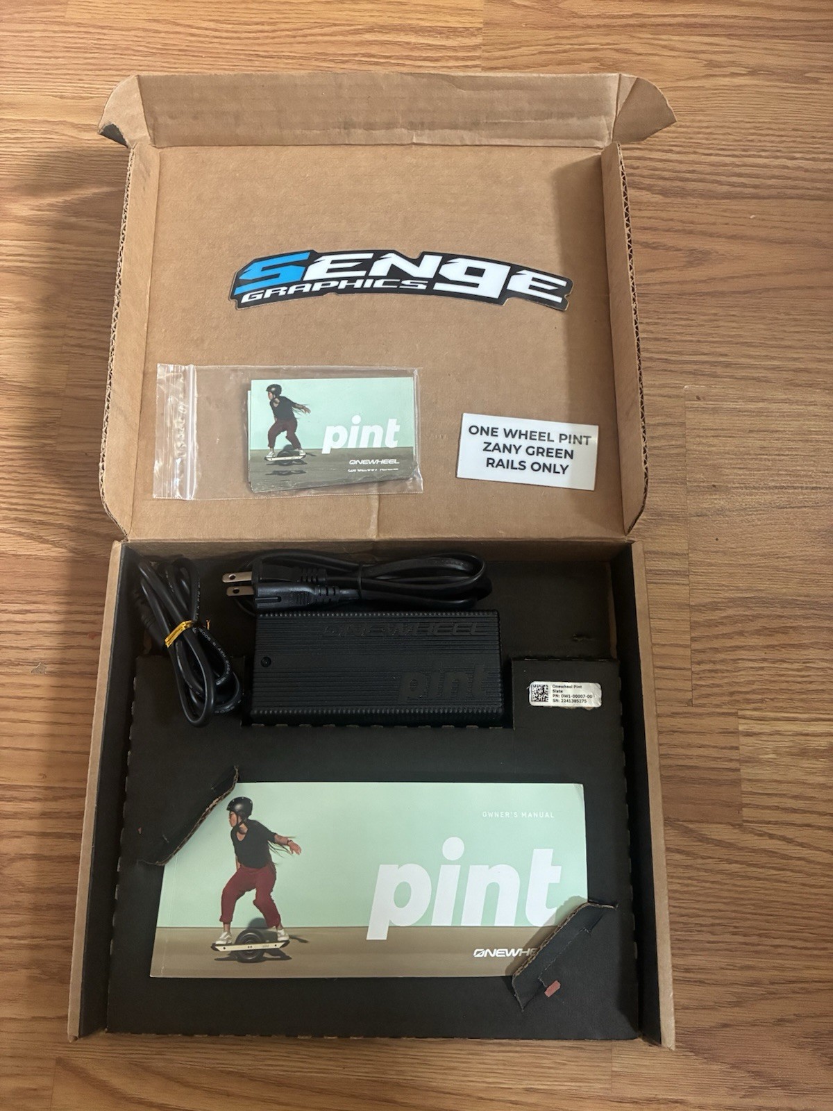 Working low mileage Onewheel Pint with custom Green Rails wrap