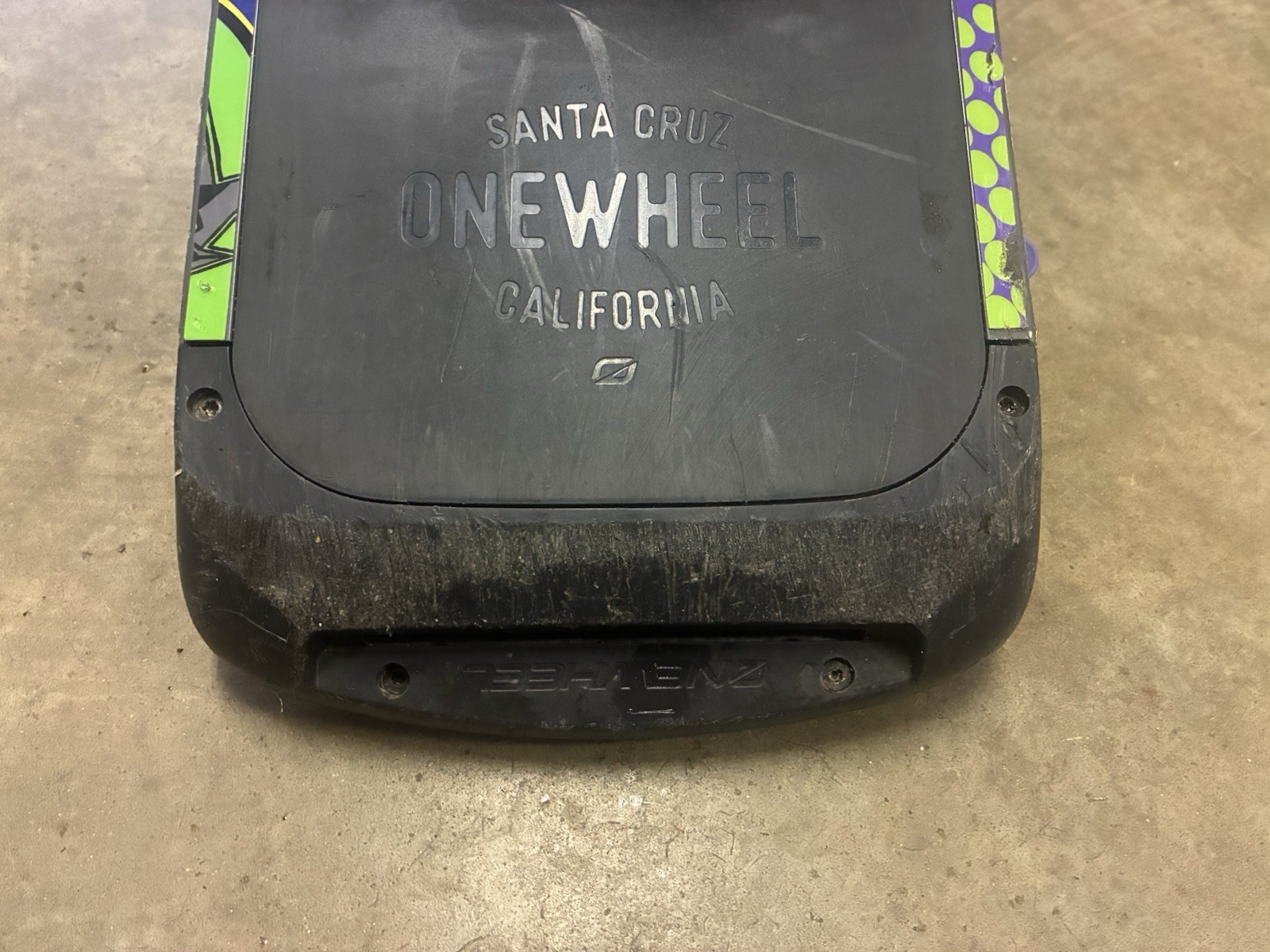 Working low mileage Onewheel Pint with custom Green Rails wrap