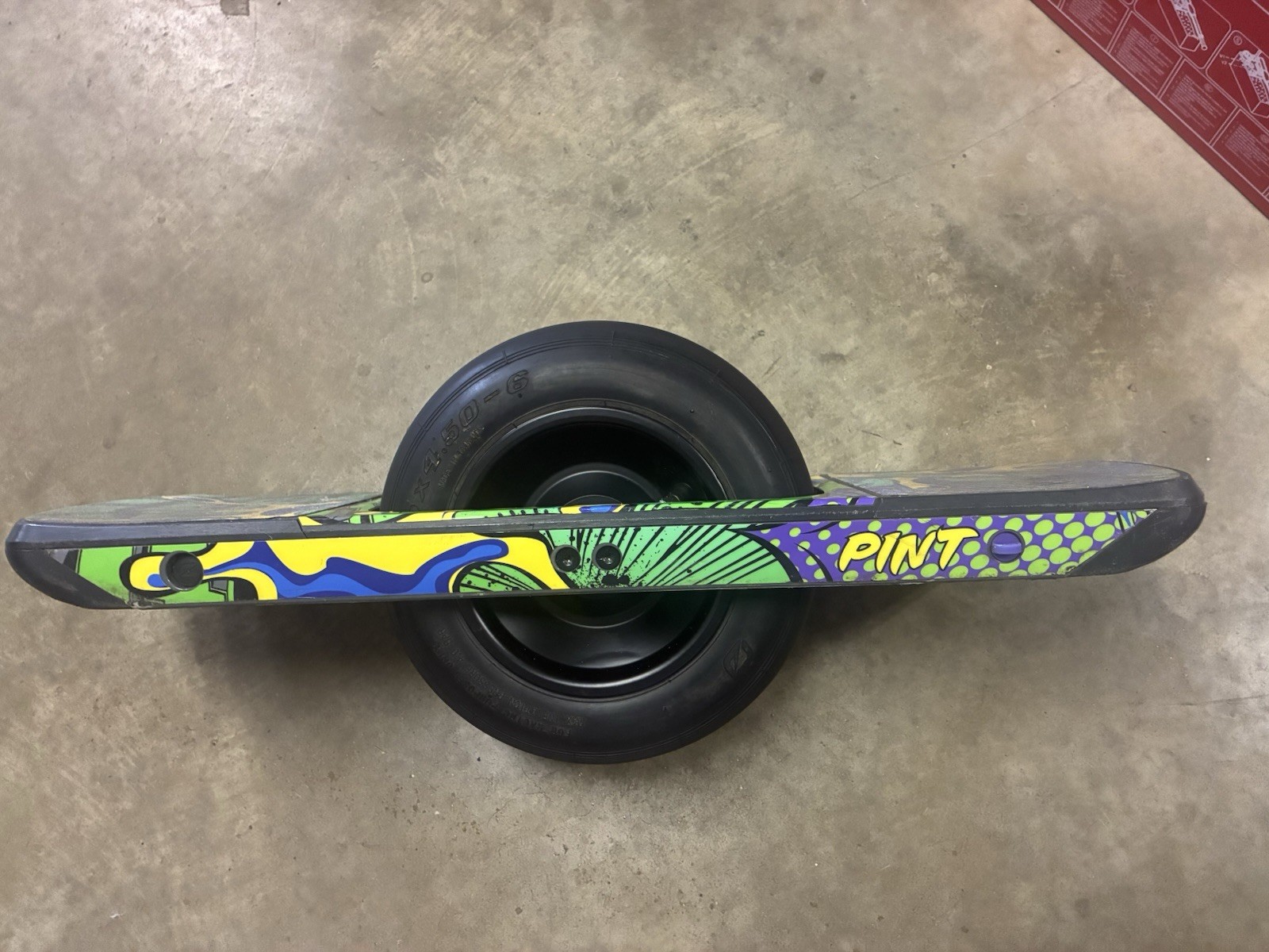 Working low mileage Onewheel Pint with custom Green Rails wrap