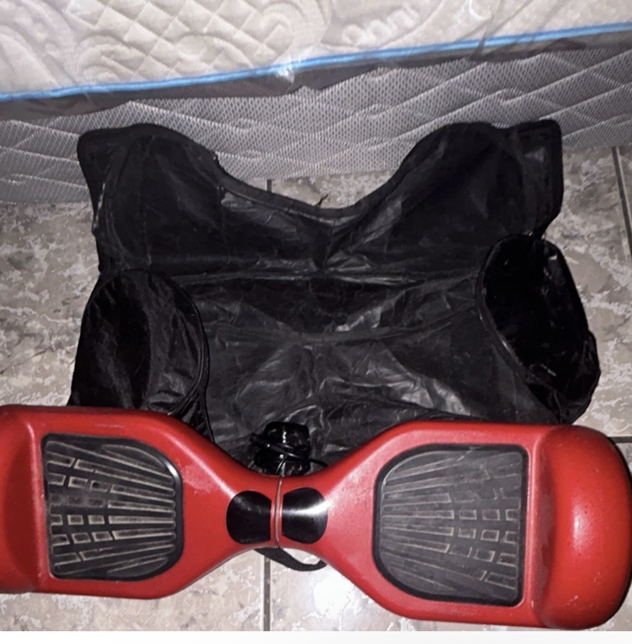 Red Self-Balancing Scooter with Charger and Carrying Bag, Black Accents